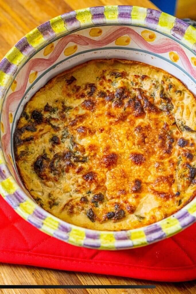 top shot of healthy spinach dip in a baking dish