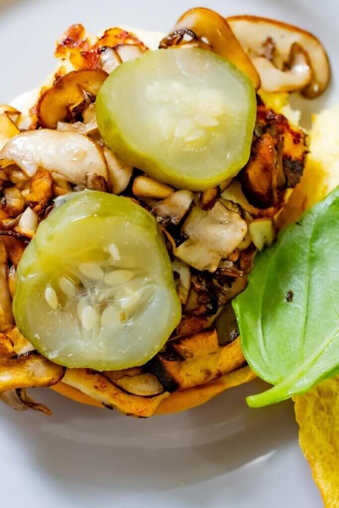 top view of a mushroom halloumi burger with no top bun