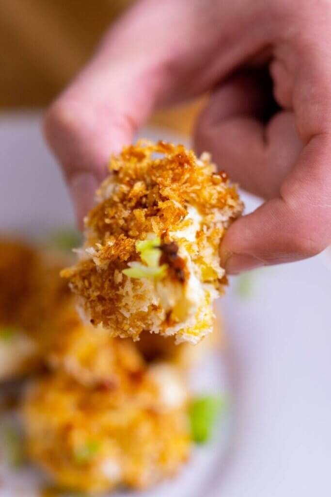 holding a crispy teriyaki cauliflower bite