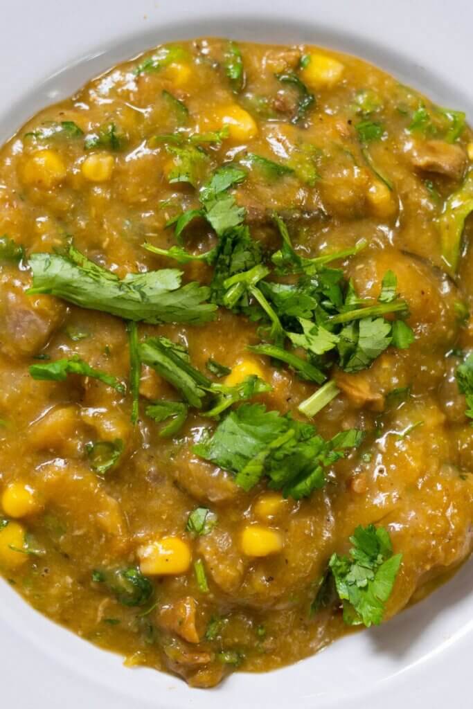 top view of a large bowl of vegan sancocho garnished with cilantro.