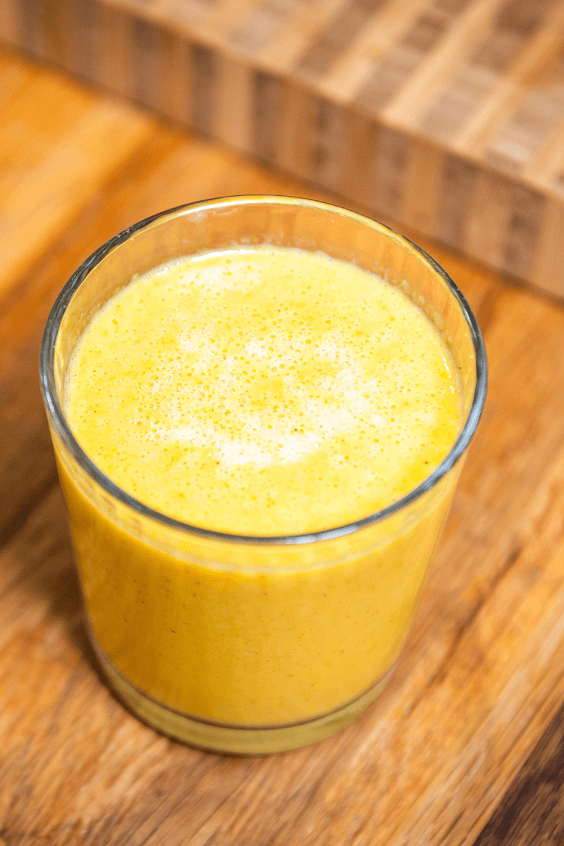 Top view of a homemade golden milk smoothie.